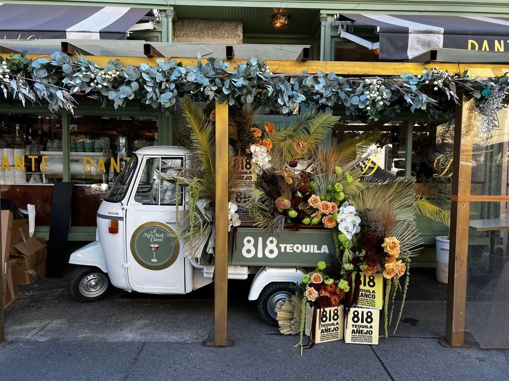 A branded 818 Tequila event activation with florals