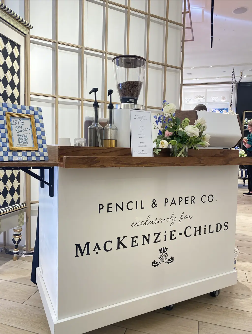 A Mackenzie-Childs branded espresso bar
