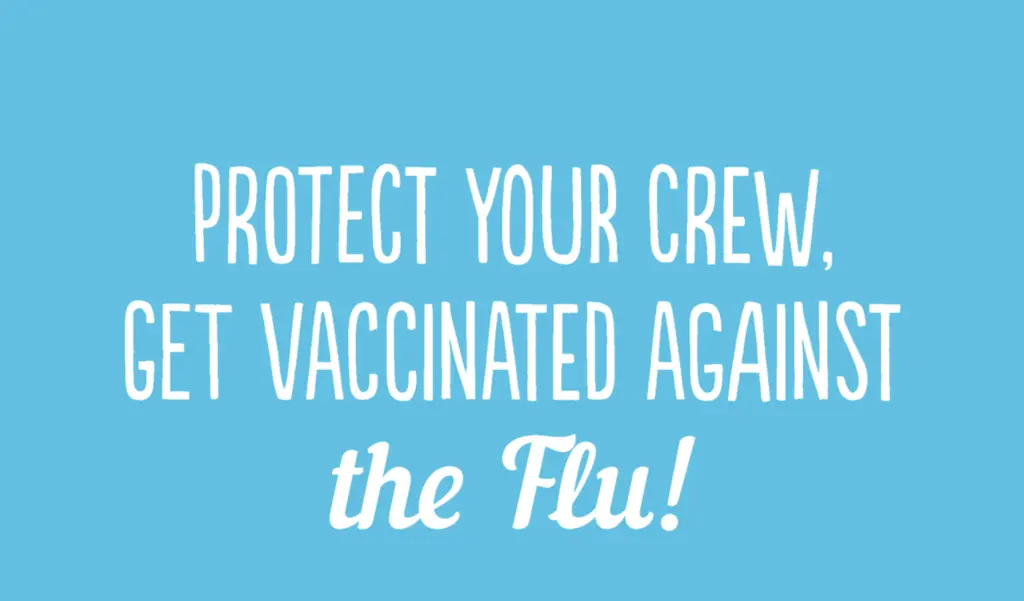 A blue background with white text that reads: Protect your crew, get vaccinated against the flu! urging people to get their flu shots.