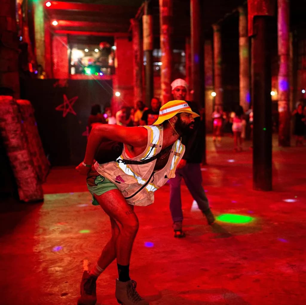 someone dodging a laser in a laser tag arena