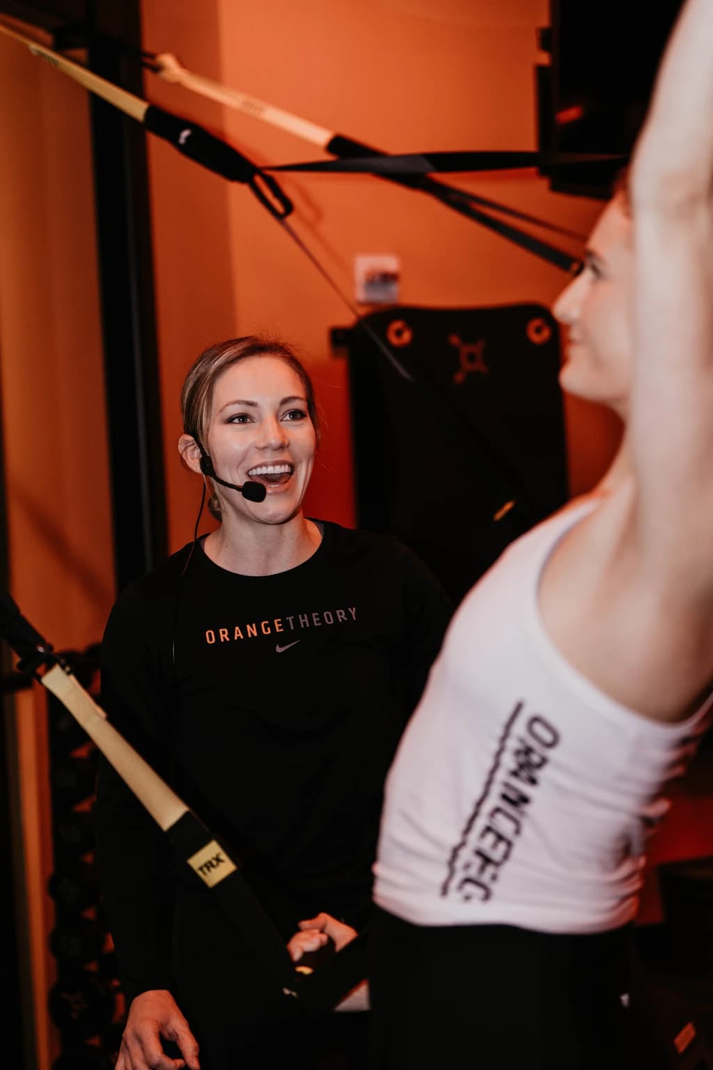 an instructor telling someone how to do an exercise
