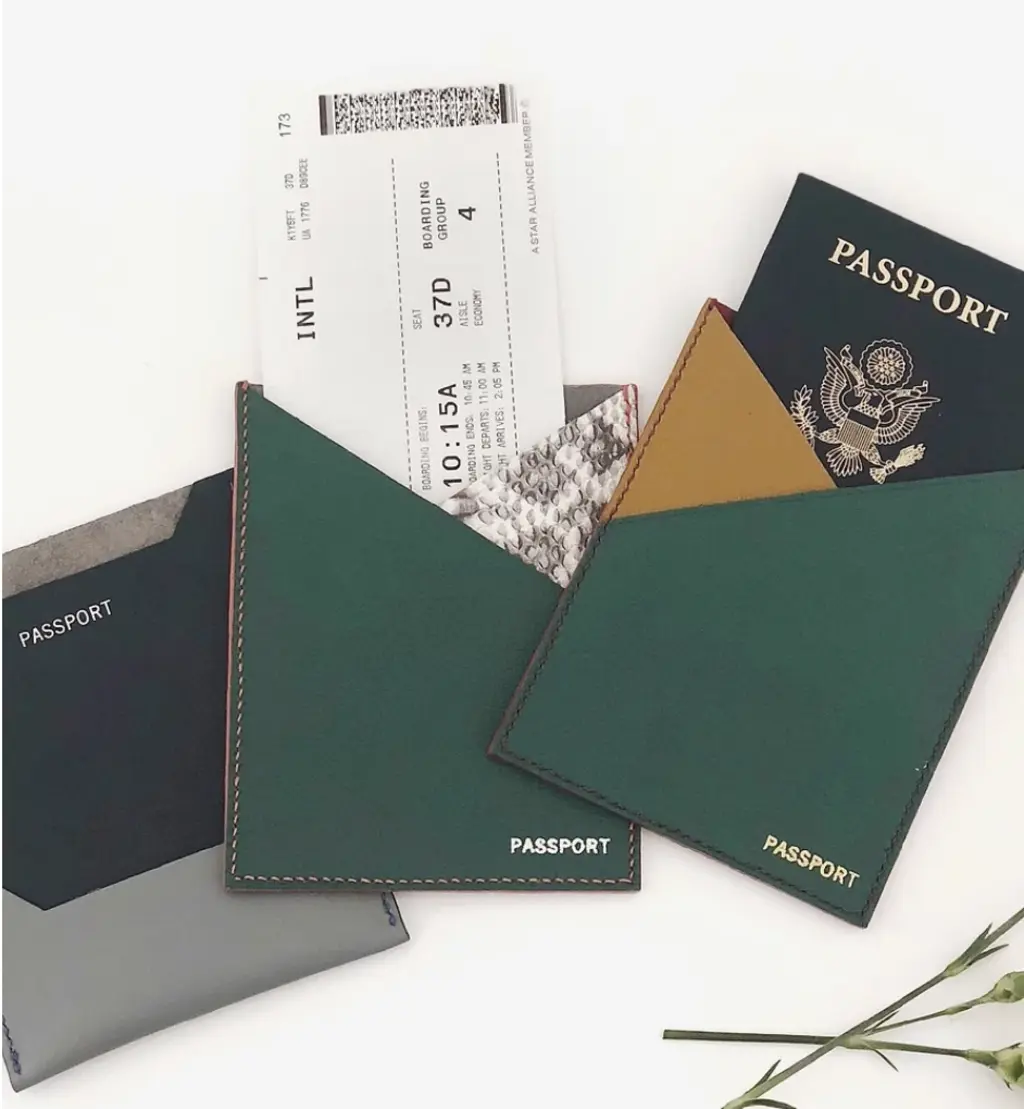 leather passport holders on a table