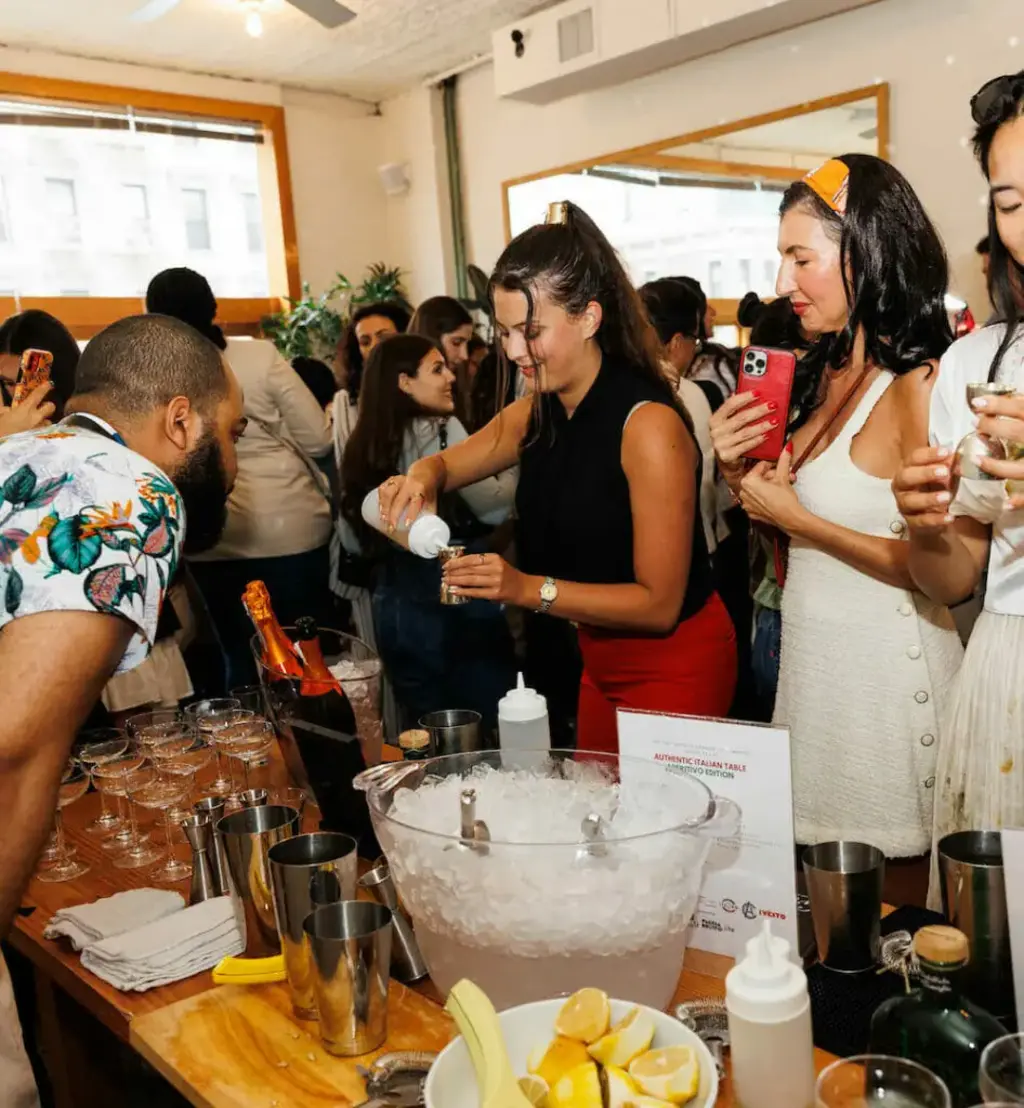a group of people enjoying drinks at a pop up bar